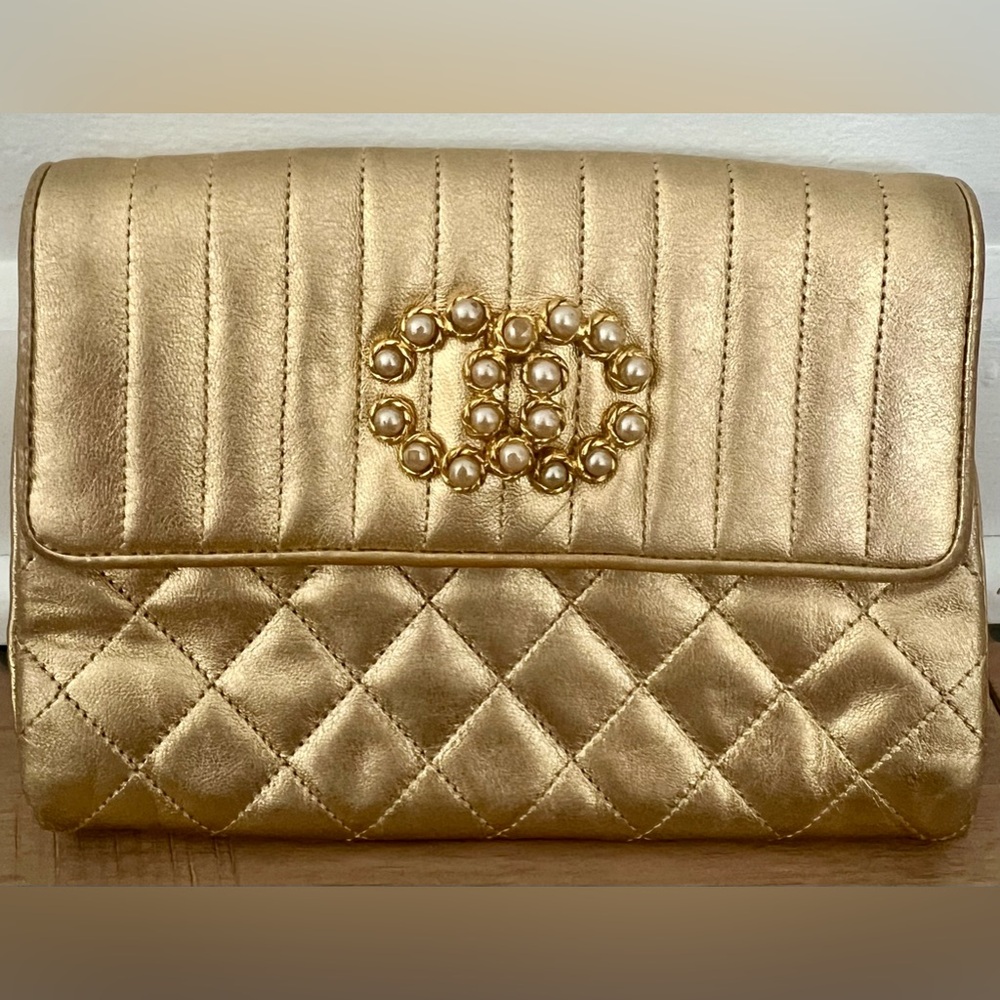 CHANEL Gold Lambskin Clutch/Purse with pearl/gold “CC”